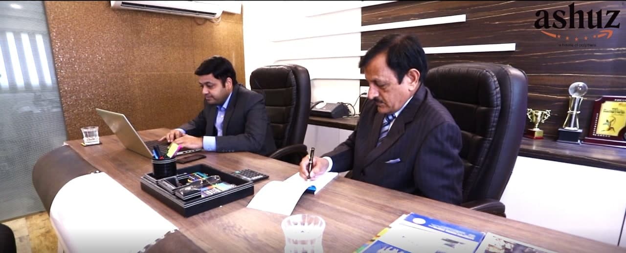 Founder of A.P. Plastic Industries in the office with the ashuz leadership team.